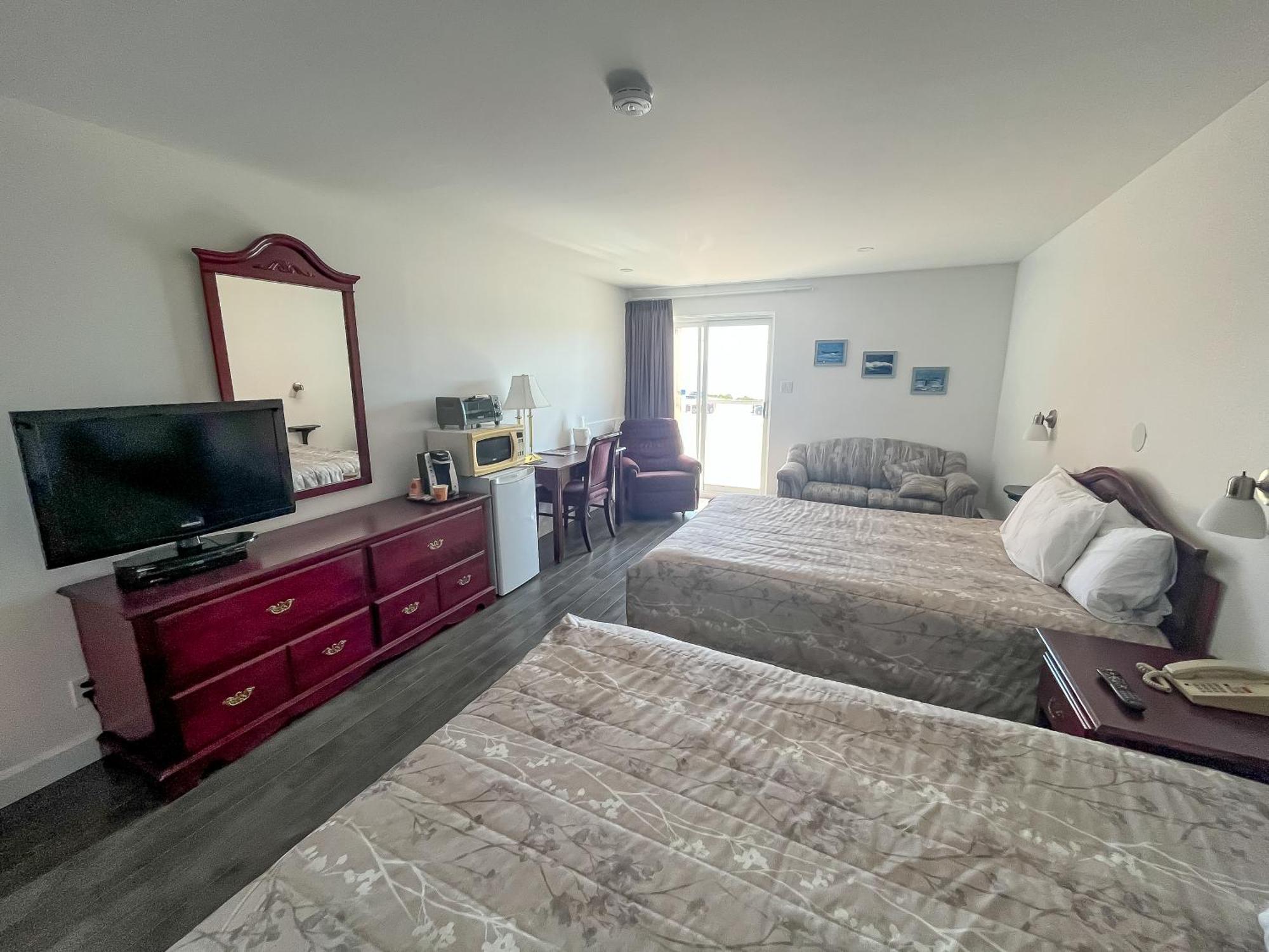 Complexe Hotelier Escoumins 레 제쿠망 외부 사진